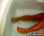 Brunette Masturbating In The Bathtub