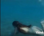 Julia is swimming underwater nude i