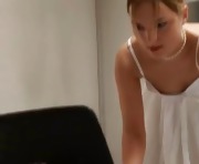 luxury girl before webcam on her laptop